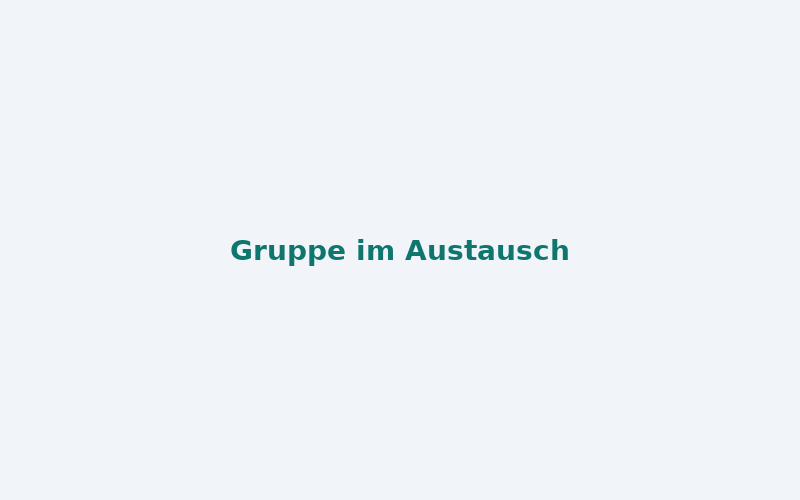 Gruppe von Menschen in einem Stuhlkreis